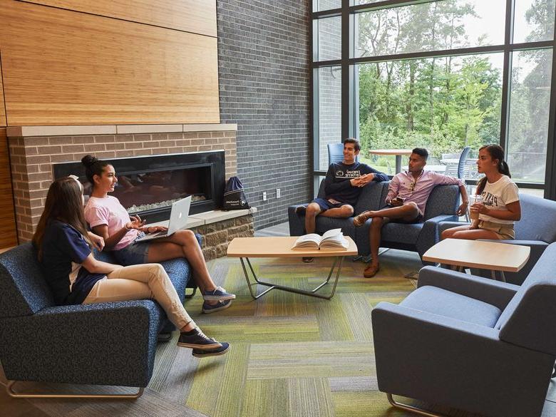 students hanging out in Penn State Abington lions gate lounge near Philadelphia